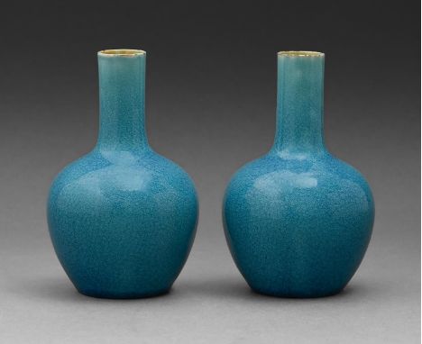 A pair of Linthorpe art pottery vases, late 19th c, in kingfisher blue glaze, 13cm h, impressed mark Small chips to glaze aro