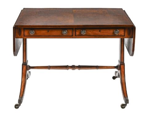 A George III satinwood and rosewood sofa table, fitted with two drawers and opposing dummy drawer, on swept legs with ring tu