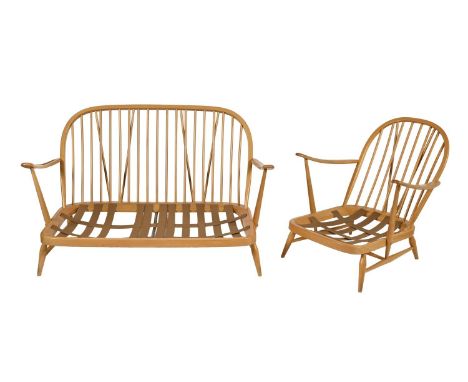 An Ercol mid-century Windsor two seater sofa, 134cm w and an armchair en suite, 70cm w Both with some minor scuffs to armsTin
