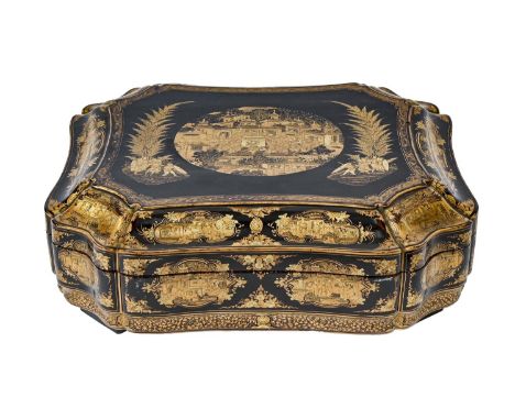 A Chinese export black and gold lacquer games box, c1840, the interior fitted with seven boxes and covers and ten counter tra