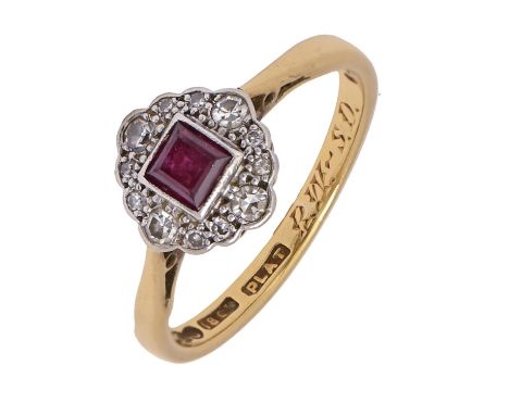 A ruby and diamond ring, gold hoop marked 18ct PLAT, 2.5g, size J Good condition
