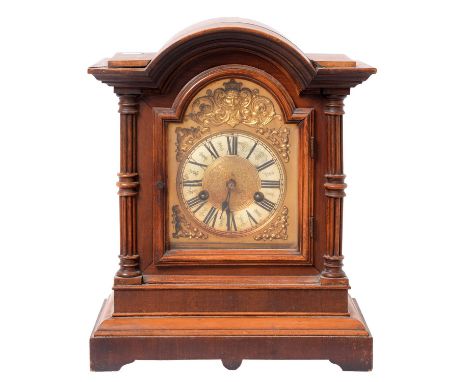 A German walnut mantle clock, c1900, in architectural face, pendulum, 36cm h Clock case water damaged with small loss