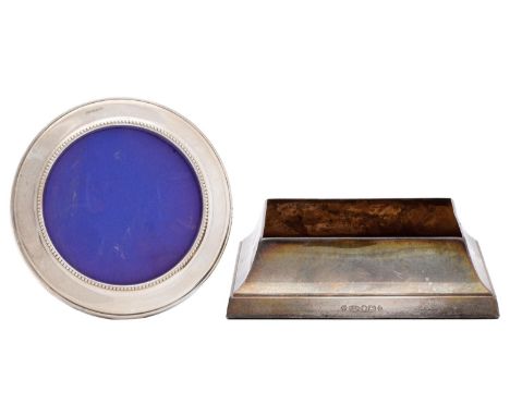 An Elizabeth II square silver decanter stand, inset sycamore base, to accommodate a decanter of 10.3 x 10.3cm, maker R C, She