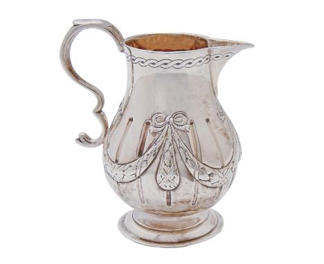 A Victorian silver cream jug, chased with festoons, 88mm h, by Robert Vicker, London 1871, 3oz 3dwt Light wear and possible o