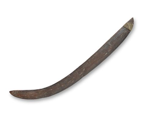 An Australian Aboriginal boomerang, 19th c, bound at one end, 71cm l Split at one end, chip to edge, wear consistent with age