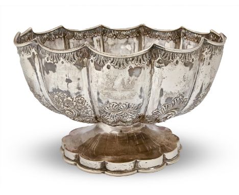A Victorian silver rose bowl, of fluted urnular form, chased with fruit and flowers, on scalloped foot, engraved with armoria