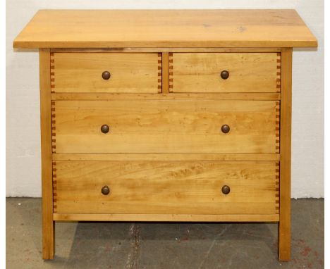 A waxed pine chest of drawers, on square legs, with boarded top and brass handles, 89cm h; 121 x 48cm Marks to top surfaceMin