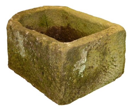A grit stone trough, 19th c, with drainage hole, approx 35cm h; approx 44 x 63cm Crack to one side