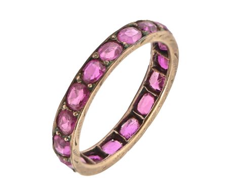 A ruby eternity ring, in gold, 1.7g, size K Wear consistent with age