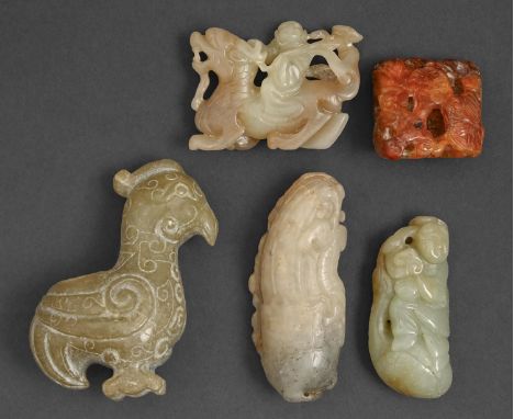 A Chinese archaic style miniature jade carving of a bird, 75mm h and four various Chinese jade peddle carvings