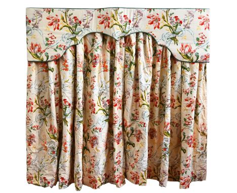 A pair of cream floral pattern cotton curtains,&nbsp;interlined, two widths in each, drop 168cm, matching shaped pelmet, cush