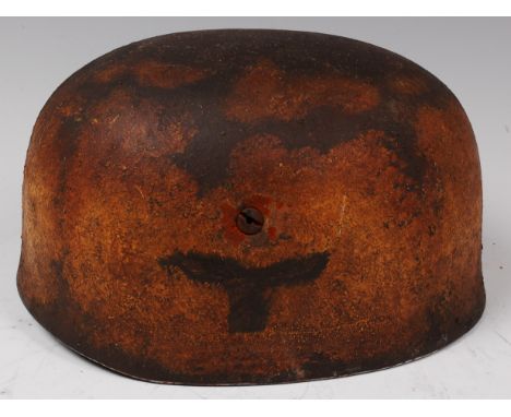 A German Paratrooper's steel helmet, having leather liner and chin straps.