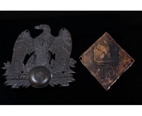 A Napoleonic French eagle shako helmet plate, together with one other shako plate. (2)