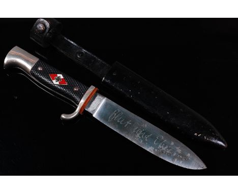 A German Third Reich Hitlerjugend, the 14cm single edged blade etched "Blut und Ehre" (Blood and Honour) and stamped Hubertus