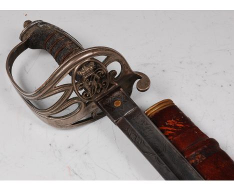 An 1854? pattern Infantry Officer's sword, the 87cm single edged fullered blade, etched with a crowned cypher and stamped W.K