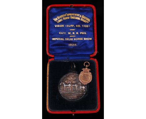 A Hunters' Improvement & National Light Horse Breeding Society silver medal, dated 1928, in original box of issue, naming Cap