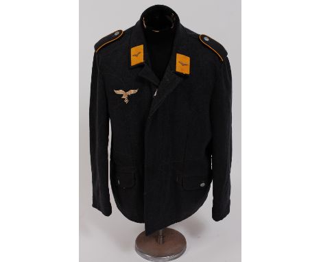A German Luftwaffe Paratrooper's blouse with silk lined interior.