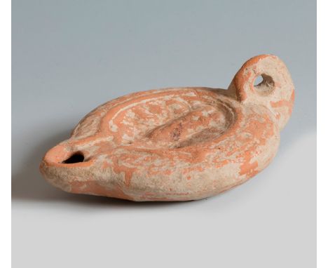 Lucerne with the image of Medusa. Rome, 2nd-3rd century AD.Terracotta.Provenance: private collection, Bordeaux.In good state 