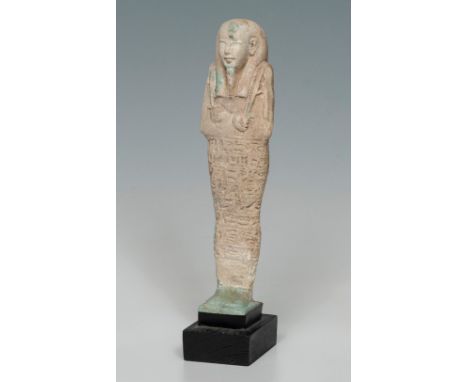 Ushebti; Egypt, Lower Egypt, 664-332 BC.Fayenza.It has losses in the glaze.Measurements: 19 x 5 x 3.5 cm.Ushebti in faience t