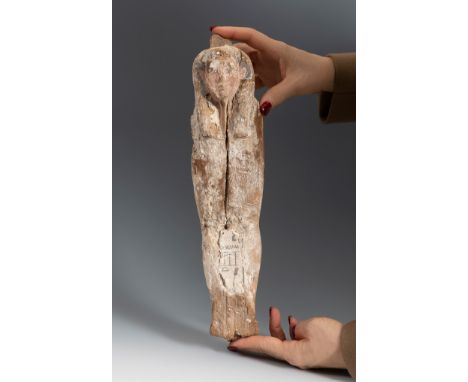 Ptah-Sokar-Osiris. Egypt, Ptolemaic period, 332-30 BC.Sycamore wood.Measurements: 39 x 10 x 8 cm.Mummiform figure representin