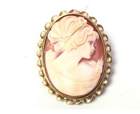 OVAL CAMEO BROOCH, AND OTHER ITEMS  the brooch in a nine carat gold surround, along with a Mascot compact and two evening bag