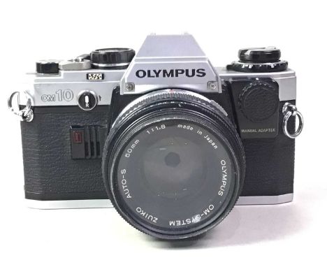 OLYMPUS OM 10 CAMERA, ALONG WITH AN AGFA CAMERA the first with 50mm 1:1.8 lensQty: 2