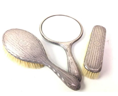 GROUP OF SILVER PART VANITY SETS, comprising brushes and mirrors