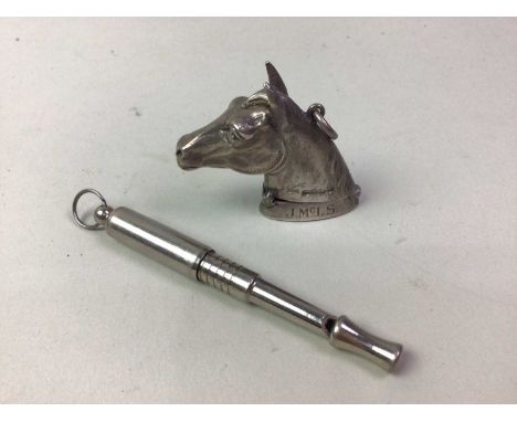 VICTORIAN SILVER NOVELTY VESTA CASE, BIRMINGHAM MARKS modelled as a horse's head, along with a canon form whistleOverall dece