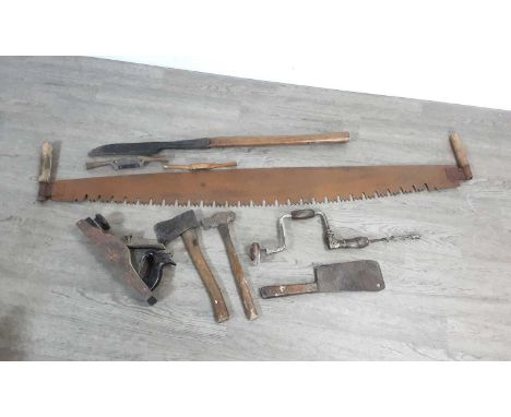 GROUP OF VINTAGE TOOLS, including a large double handled saw, wood plane, axe and hand drill