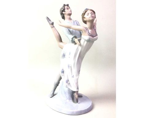 NAO FIGURE GROUP OF A COUPLE, ALONG WITH A LLADRO FIGURE AND A NAO BALLERINA the first modelled dancingthe first 33cm high Qt