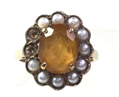 OPAL STICK PIN, along with a citrine and pearl ring, in nine carat gold, size N 1/2Qty: the ring 4.26g