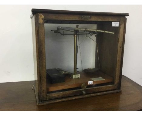 SET OF SCALES, W.B. NICOLSON  housed in an oak case, bearing makers plaquecase 46cm wide