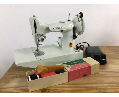 SINGER WHITE 221K SEWING MACHINE, no. EV924232, cased with accessoriesItem has not been tested