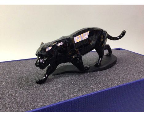 TWO SWAROVSKI CRYSTAL FIGURES, the first modelled as a panther, the second modelled as a tiger, both in original boxthe panth