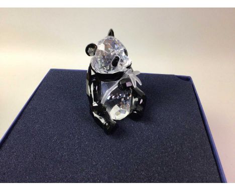 TWO SWAROVSKI CRYSTAL FIGURES, the first modelled as a polar bear, the second as a panda bear, each in original boxthe polar 