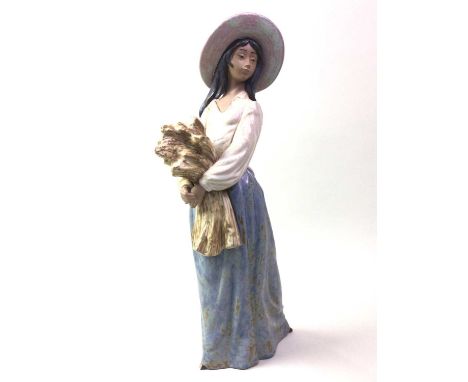 NAO GRES FIGURE OF A WOMAN, ALONG WITH ANOTHER NAO FIGURE OF A WOMAN the first modelled with wheatthe first 41cm high Qty: 2