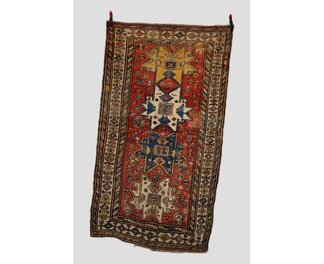 Derbend rug, east Caucasus, late 19th century, 8ft. 9in. X 4ft. 10in. 2.67m. X 1.47m. Overall wear with repairs and reweaves 