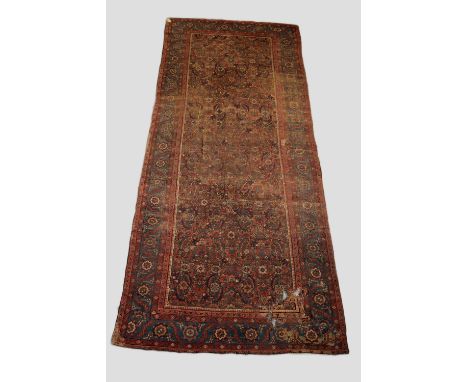 Bakhshaish kelleh, north west Persia, late 19th century, 13ft. 4in. X 5ft. 7in. 4.06m. X 1.70m. Overall wear, heavy in places