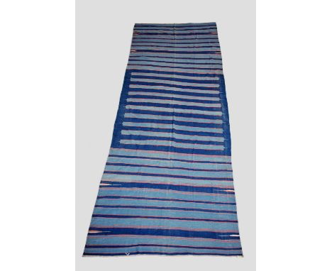 Prayer or room dhurrie, India, first half 20th century, 15ft. X 5ft. 6in. 4.57m. X 1.68m. Some surface marks; few cobbled rep