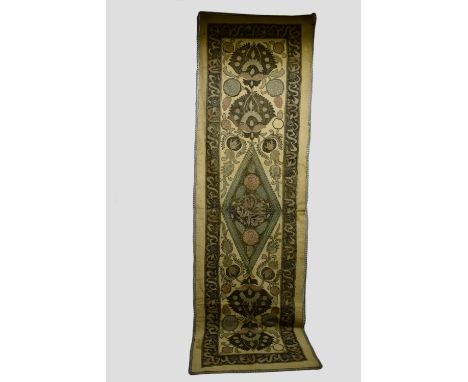 Ottoman fine cotton panel appliqued and embroidered in coloured metal threads, 20th century, 74in. X 21in. 188cm. X 53m.  Wit