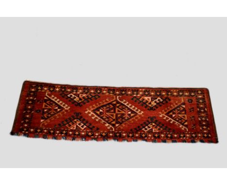 Ersari Turkmen jollar (trapping or decorative panel), south west Turkmenistan, late 19th century, 17in. X 4ft. 10in. 43cm. X 