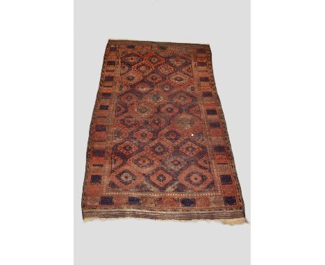 Baluchi carpet, Khorassan, north east Persia, second half 19th century, 11ft. 5in. X 6ft. 3in. 3.48m. X 1.91m. Overall wear w