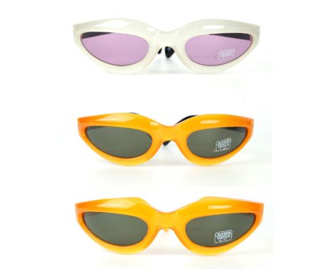 Versus by Gianni Versace: Three pairs of vintage sunglasses
The first, with pink tone lenses to a translucent white frame wit