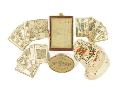 A set of fifty-three French engraved playing cards, the set decorated with coats of arms, kings and queens and other figures,