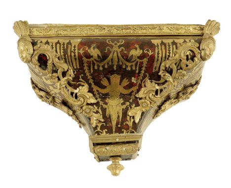 A French brass and tortoiseshell boulle marquetry clock bracket, 23cm high, 34.8cm wide.