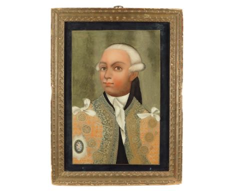 A pair of late 18th century Chinese reverse glass portrait paintings of George III and Queen Charlotte, probably after Thomas