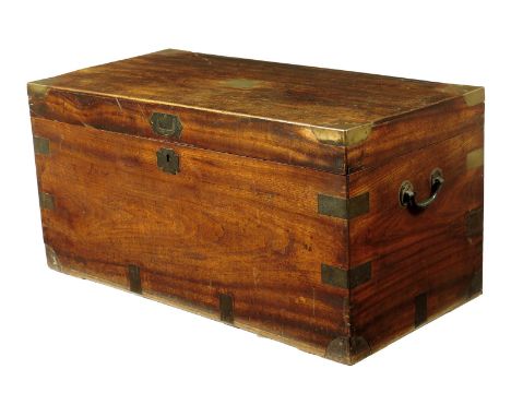 A 19th century camphorwood and brass bound trunk, the hinged lid with a vacant plaque, with iron side carrying handles, 47.3c
