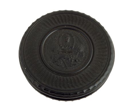A Victorian commemorative turned ebony snuff box, the lid with a circular panel with a portrait bust, with sheaves of wheat a
