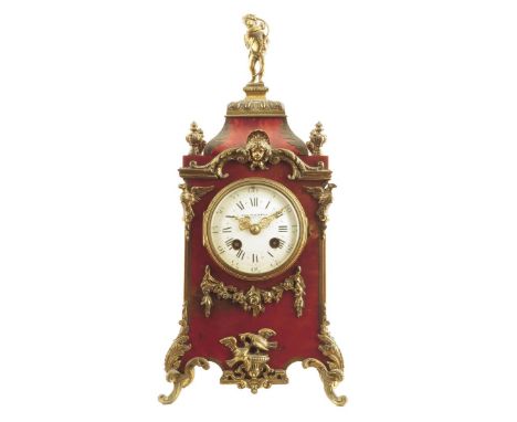 λ A late 19th century French tortoiseshell and brass mounted mantel clock, the eight day movement striking on a gong, the bac