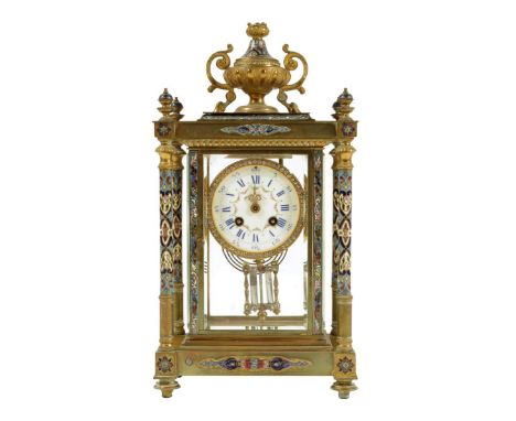 A late 19th century French gilt brass and champleve enamel four glass mantel clock, the eight day movement striking on a gong